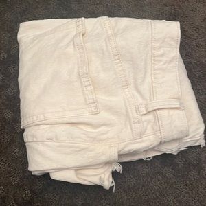 Cream Colored Ripped Jeans